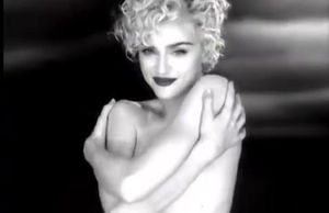 Madonna bra-less but stashing her